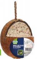 Miscela di semi e grasso ad alta energia in un guscio di cocco pronto all'uso